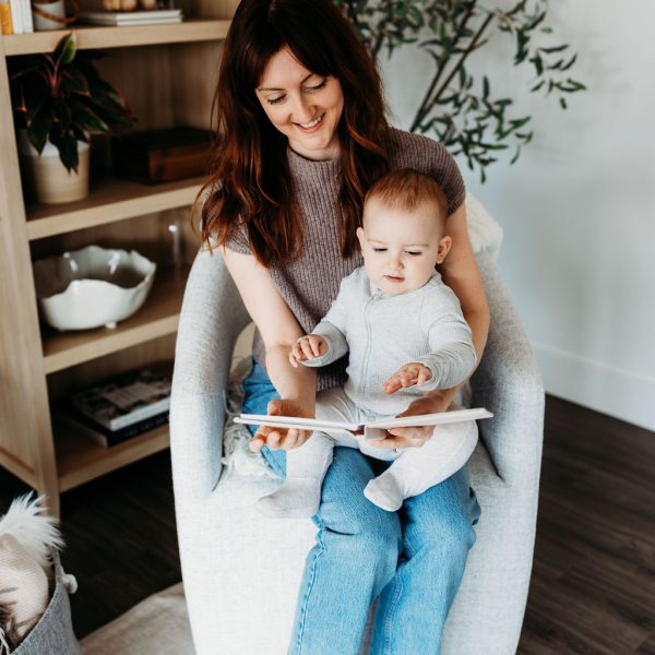 Mom reading to toddler
